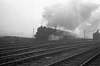 Photo 2 Near silhouette of 42715 and 45086  22 January 1966. R S Greenwood